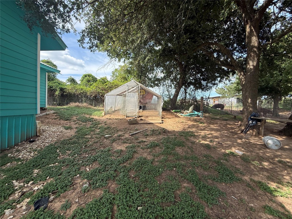 968 Red Town Road Elgin, TX 78621 - Photo 27 of 36 View of yard with an outdoor structure and an exterior structure