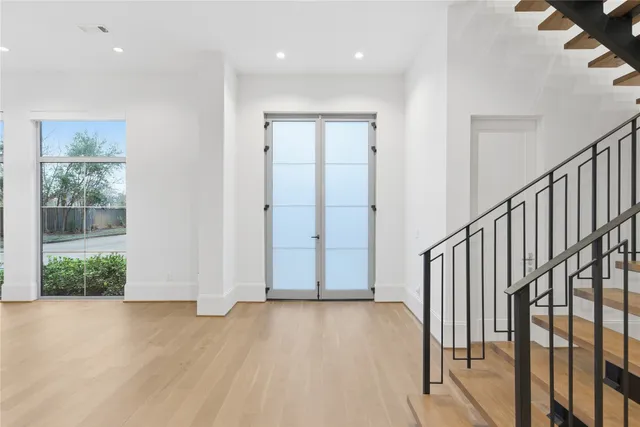 a view of entryway with wooden floor