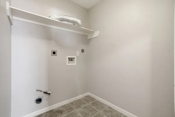 a bathroom with a sink toilet tub and shower