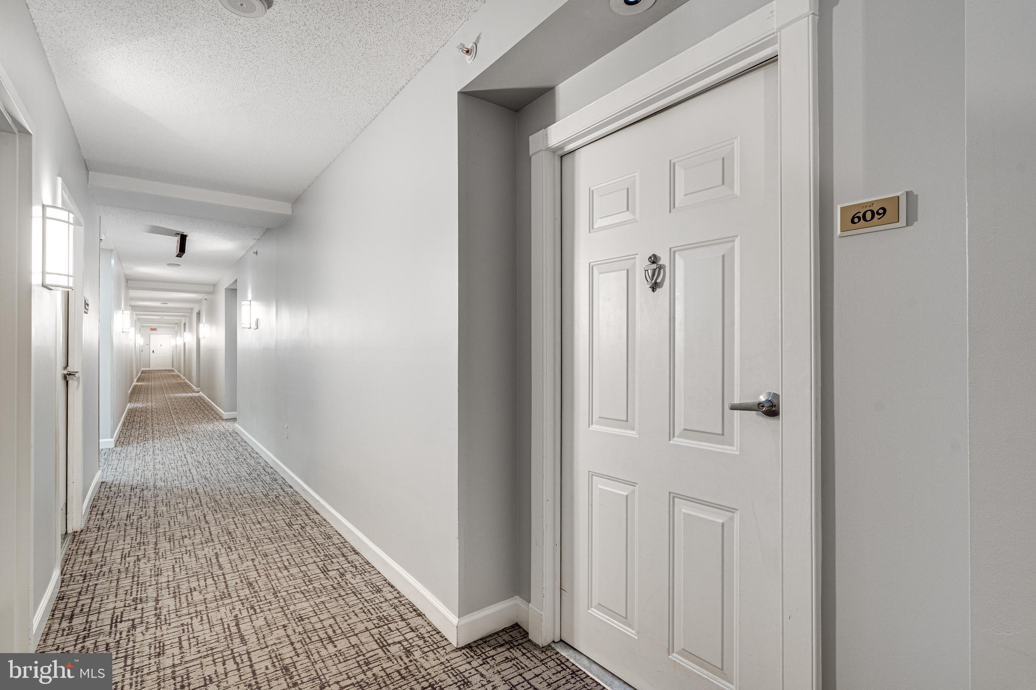 2726 Gallows Road, Unit 609 Vienna, VA 22180 - Photo 3 of 37 Well lit hallway, close to elevator