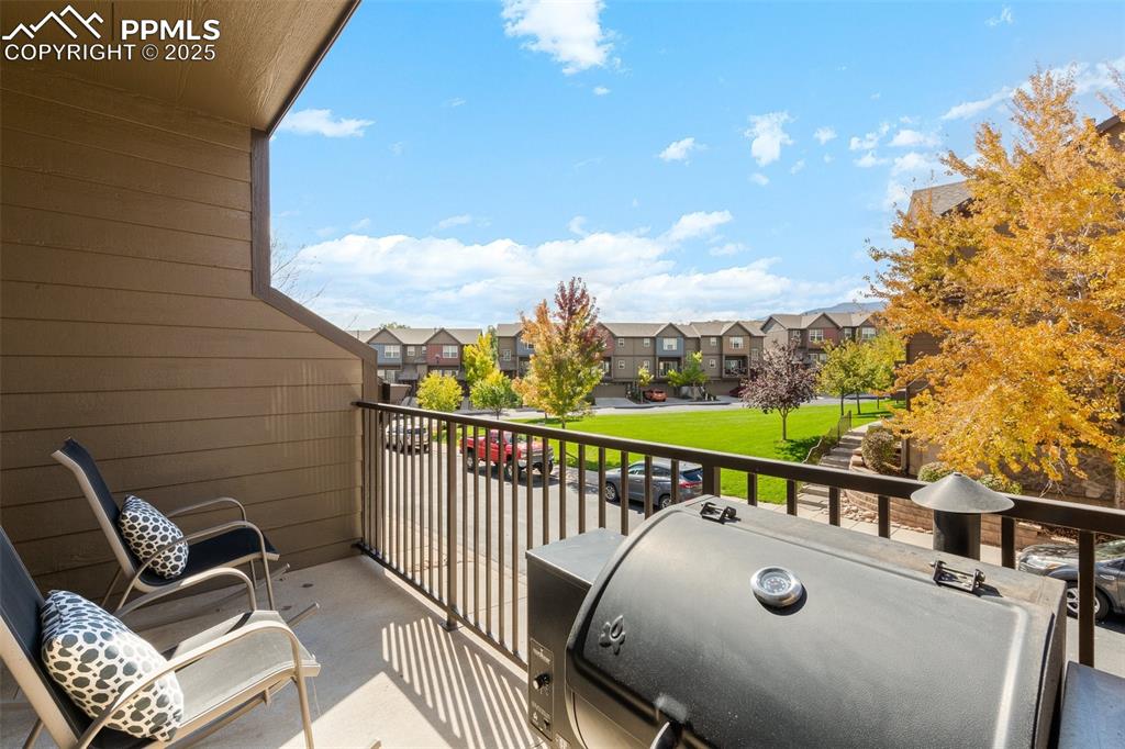 4073 Flash Point Colorado Springs, CO 80907 - Photo 18 of 20 a view of a balcony with chairs