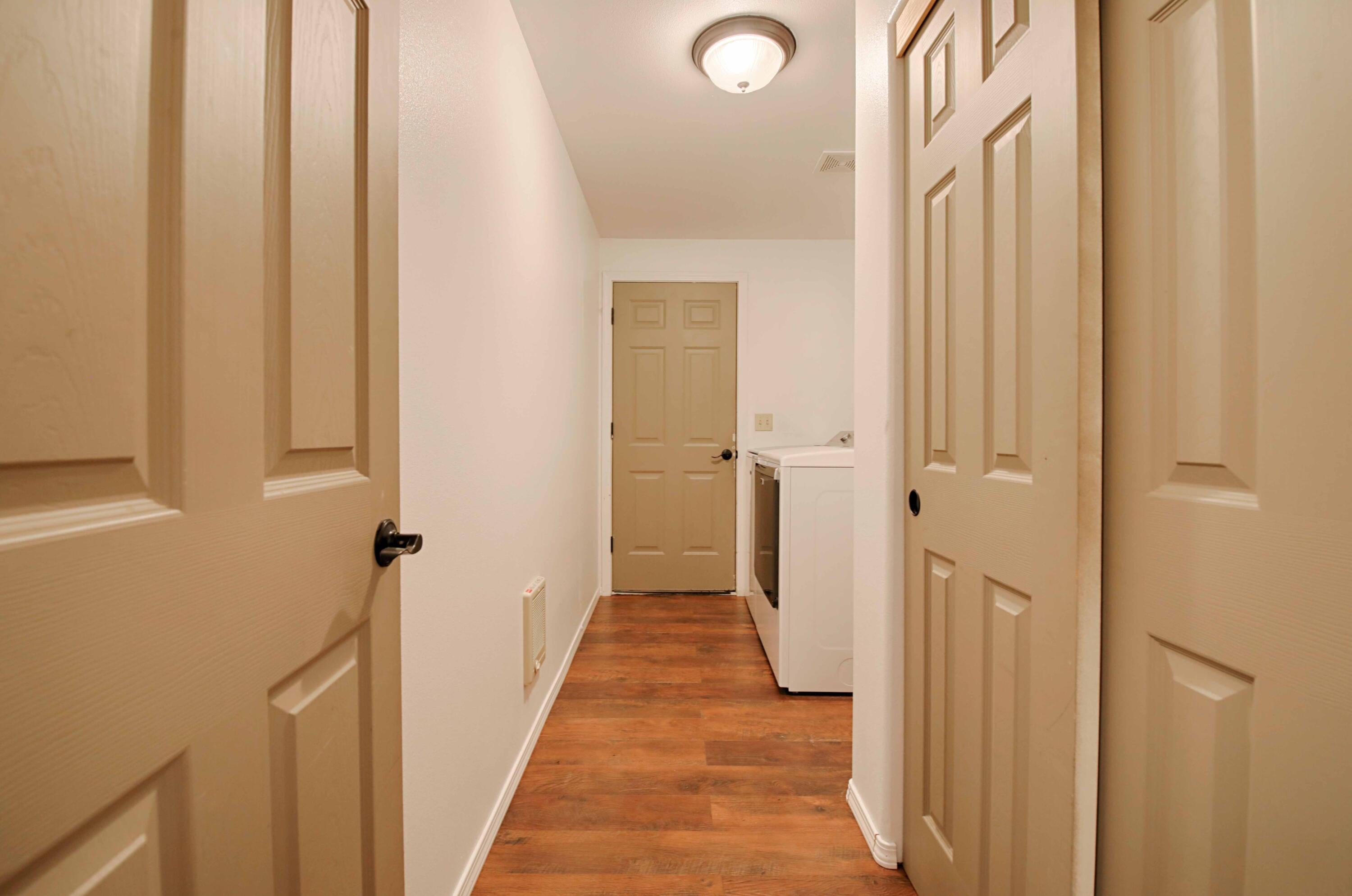 15900 Old Mill Road La Pine, OR 97739 - Photo 8 of 18 Laundry room with storage and door to garage