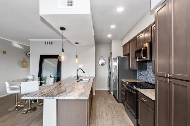 a view of a hallway with entryway