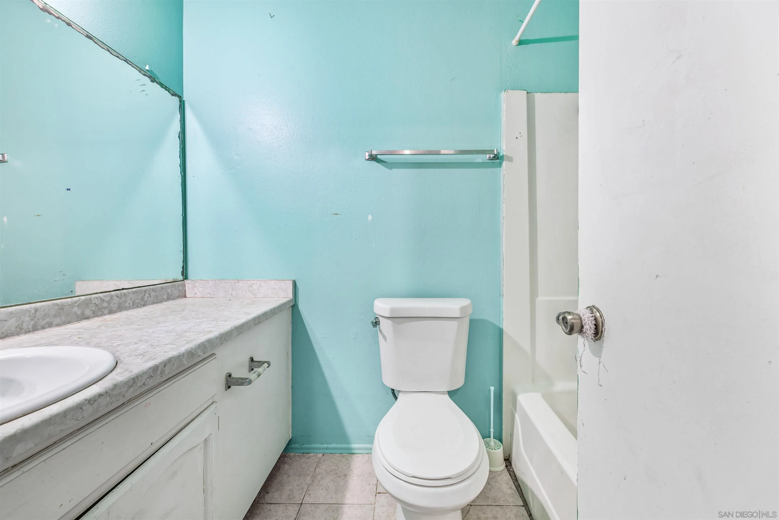 9048 Gideon Circle South Lakeside, CA 92040 - Photo 11 of 21 a bathroom with a granite countertop toilet and a sink