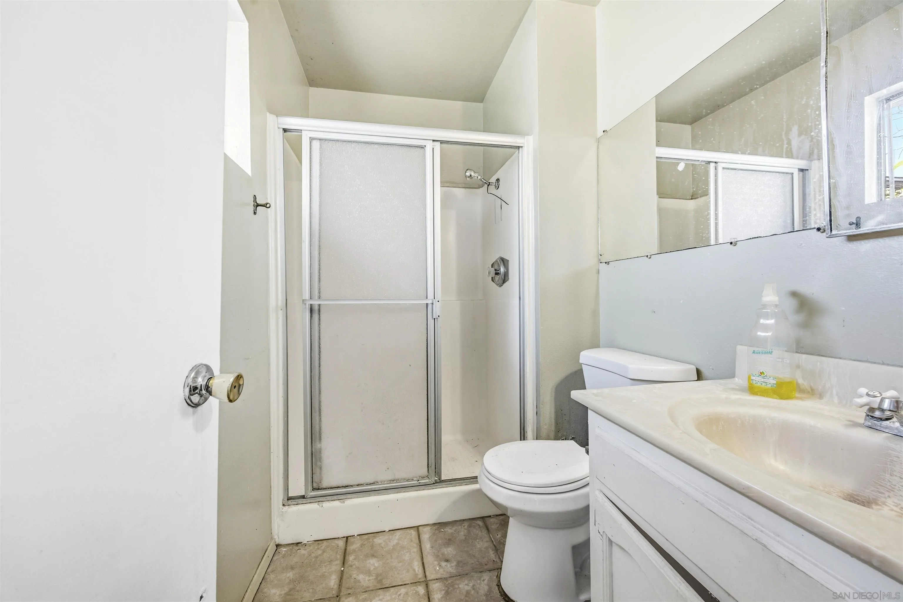 9048 Gideon Circle South Lakeside, CA 92040 - Photo 14 of 21 a bathroom with a sink a toilet and shower