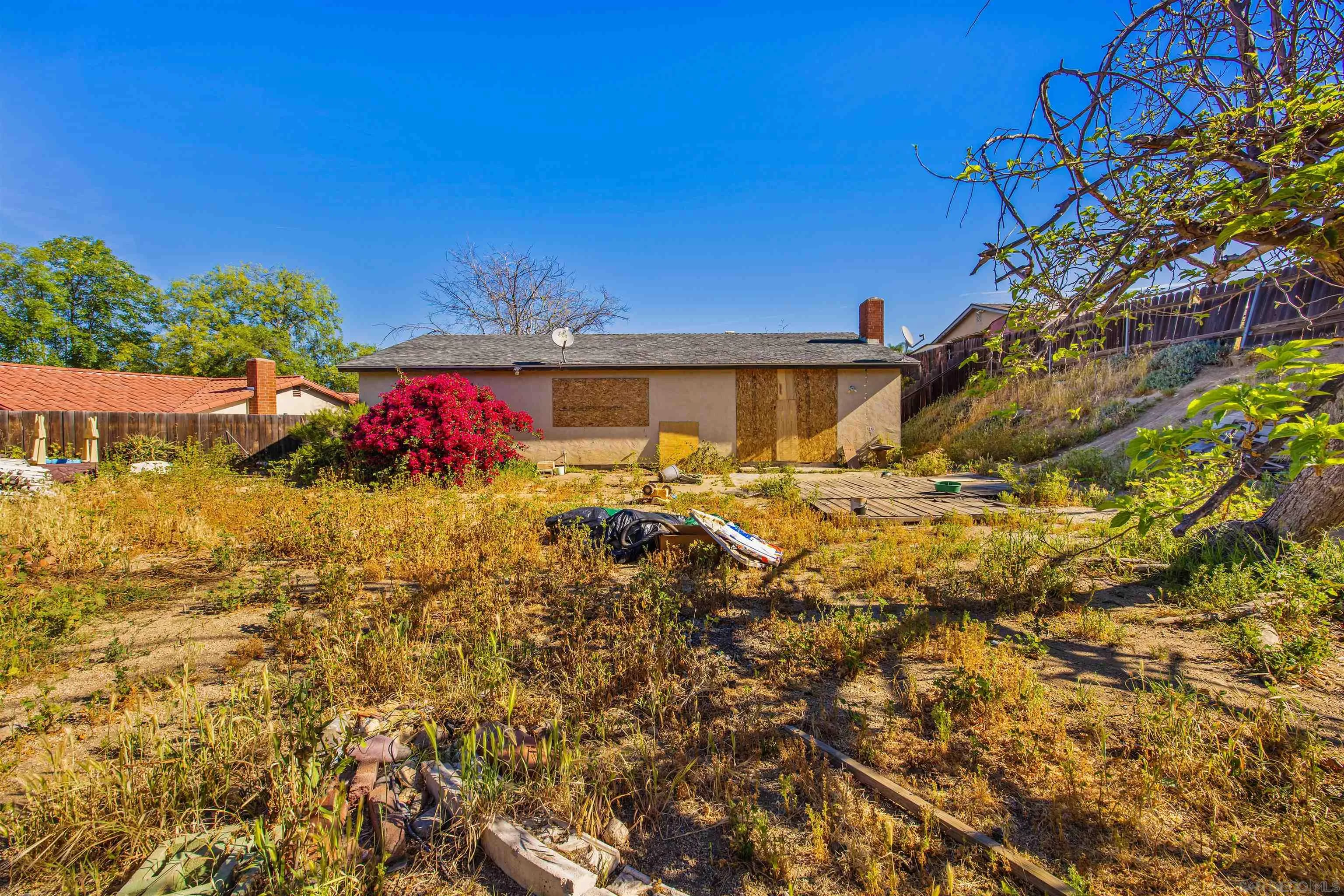 9048 Gideon Circle South Lakeside, CA 92040 - Photo 18 of 21 a view of a house with a yard