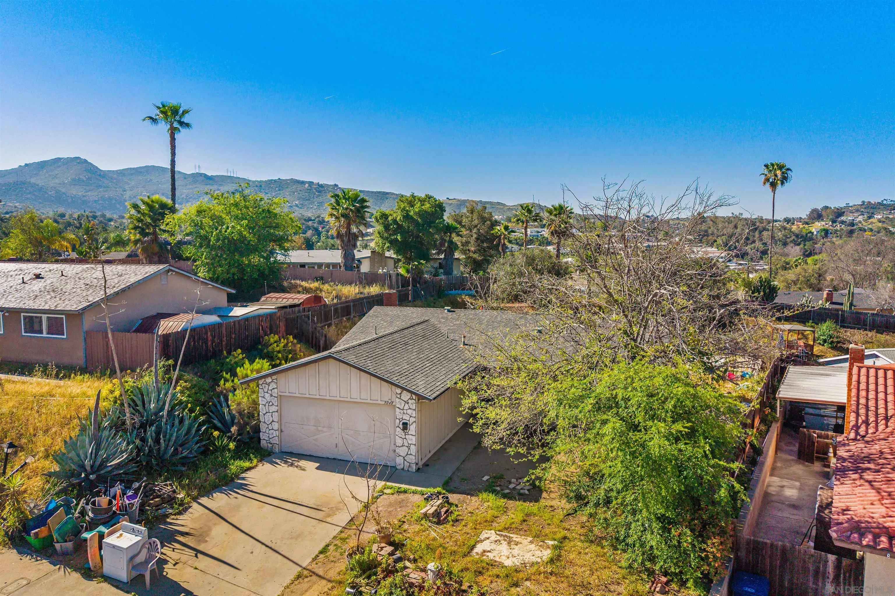 9048 Gideon Circle South Lakeside, CA 92040 - Photo 19 of 21 a view of a house with a garden