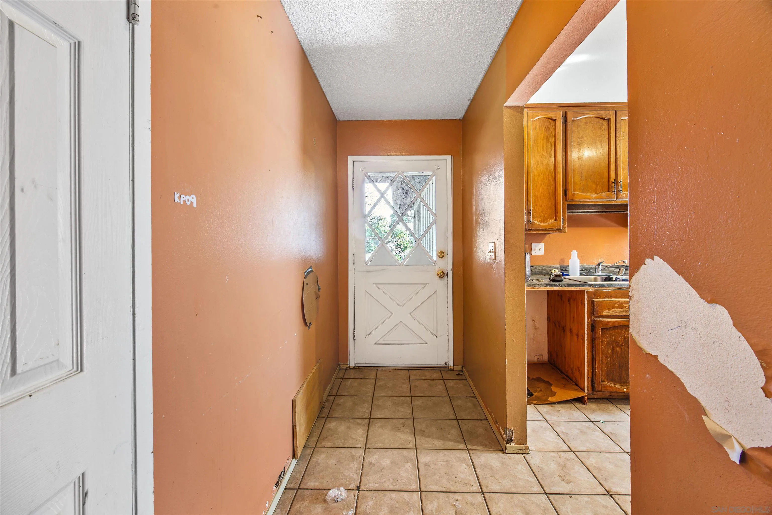 9048 Gideon Circle South Lakeside, CA 92040 - Photo 3 of 21 a view of a hallway with wooden floor and a bathroom