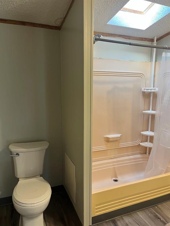 272 Duff Street Bobtown, PA 15315 - Photo 23 of 26 a bathroom with a toilet and a glass door shower