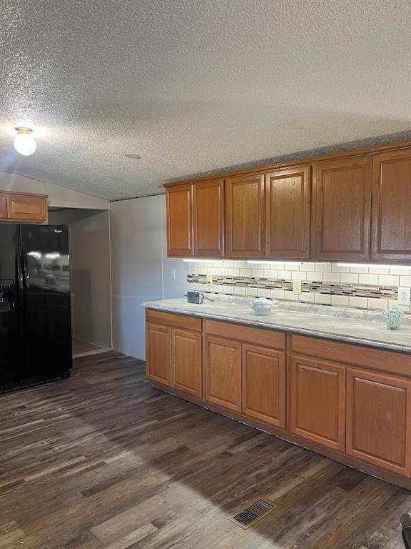 272 Duff Street Bobtown, PA 15315 - Photo 10 of 26 a kitchen with granite countertop a refrigerator and cabinets
