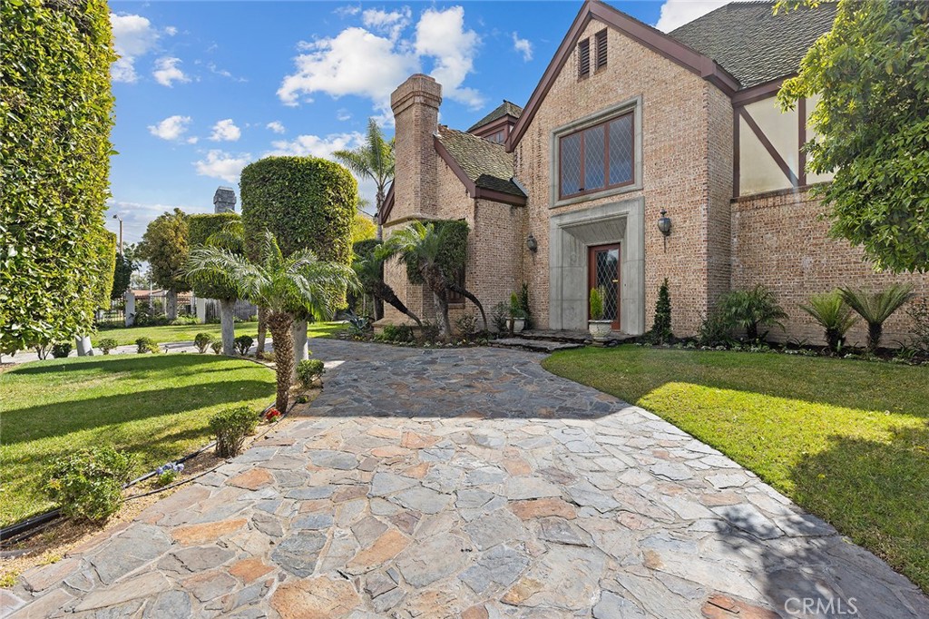 a view of a building with a garden