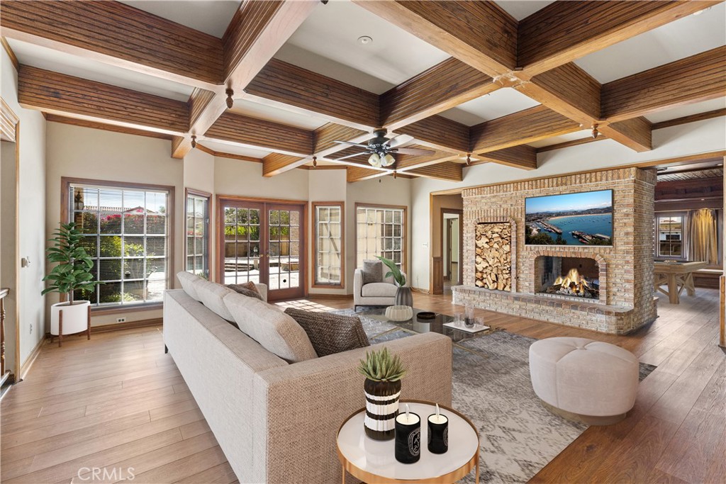 11550 183rd Street Artesia, CA 90701 - Photo 12 of 67 a living room with furniture and a fireplace