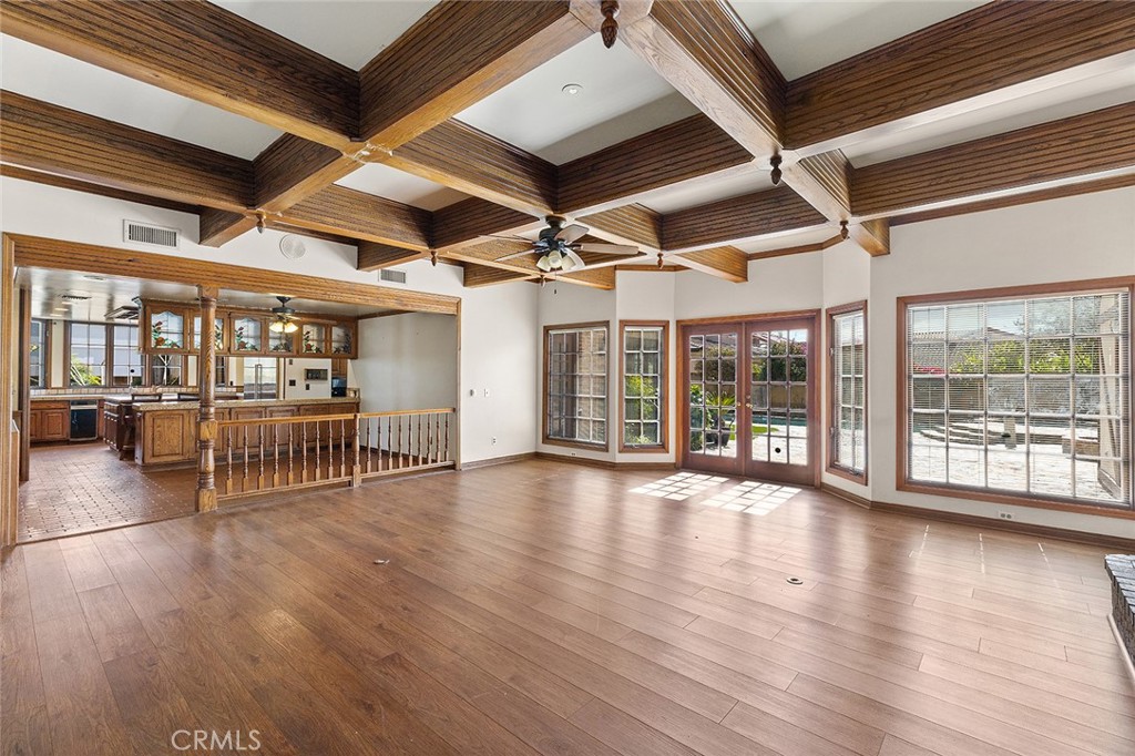 11550 183rd Street Artesia, CA 90701 - Photo 14 of 67 a view of an empty room with wooden floor