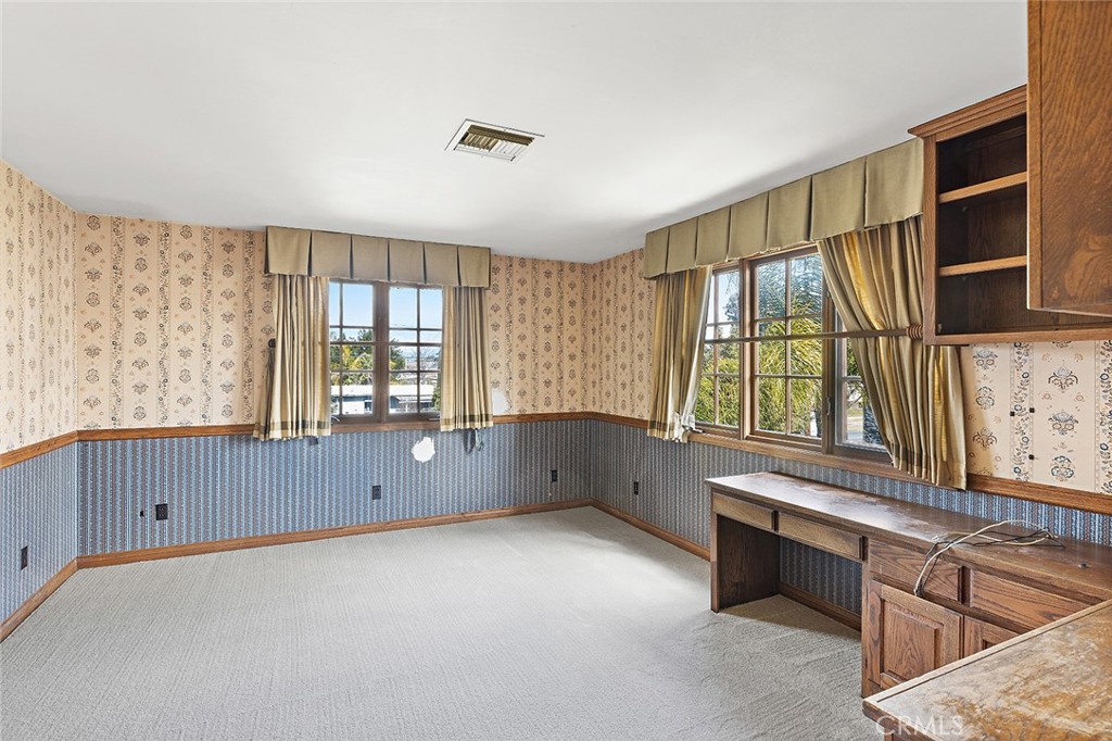11550 183rd Street Artesia, CA 90701 - Photo 41 of 67 guest bedroom #1 with built-in desk & walk -in closet