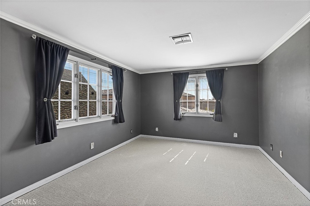 11550 183rd Street Artesia, CA 90701 - Photo 46 of 67 a view of an empty room with a window