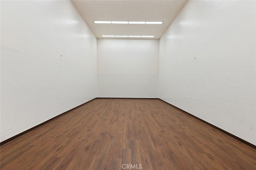 11550 183rd Street Artesia, CA 90701 - Photo 50 of 67 a view of empty room with wooden floor