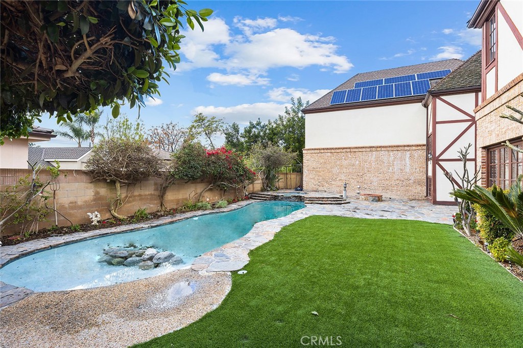11550 183rd Street Artesia, CA 90701 - Photo 53 of 67 a view of a backyard with sitting area
