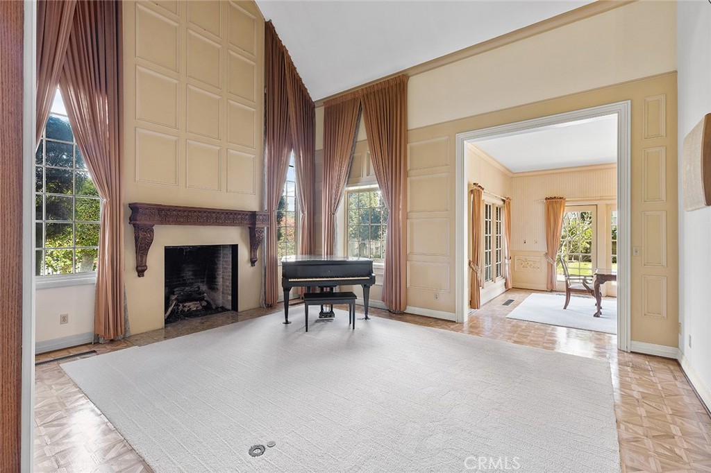 11550 183rd Street Artesia, CA 90701 - Photo 6 of 67 a view of a livingroom with furniture and a fireplace