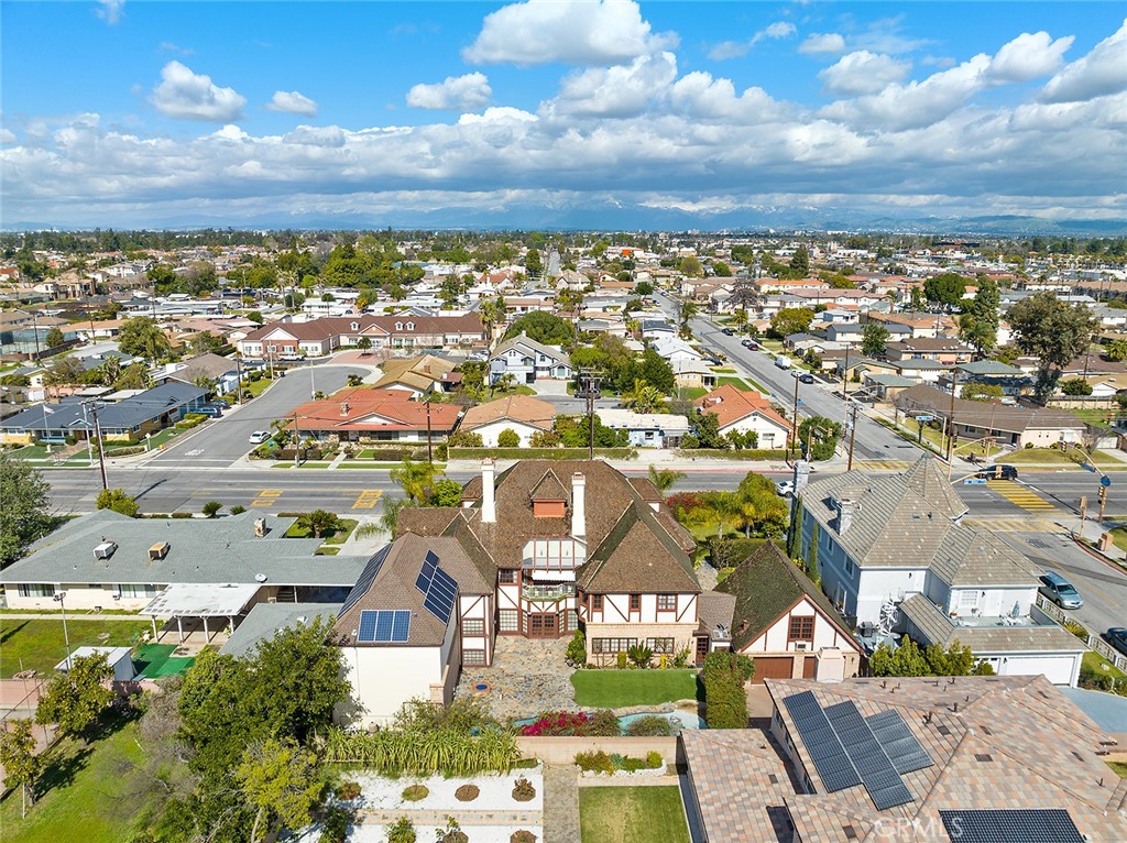 11550 183rd Street Artesia, CA 90701 - Photo 62 of 67 an aerial view of residential houses with outdoor space and street view