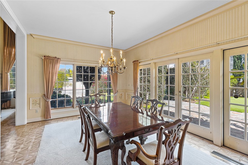 11550 183rd Street Artesia, CA 90701 - Photo 8 of 67 a view of a dining room with furniture window and outside view