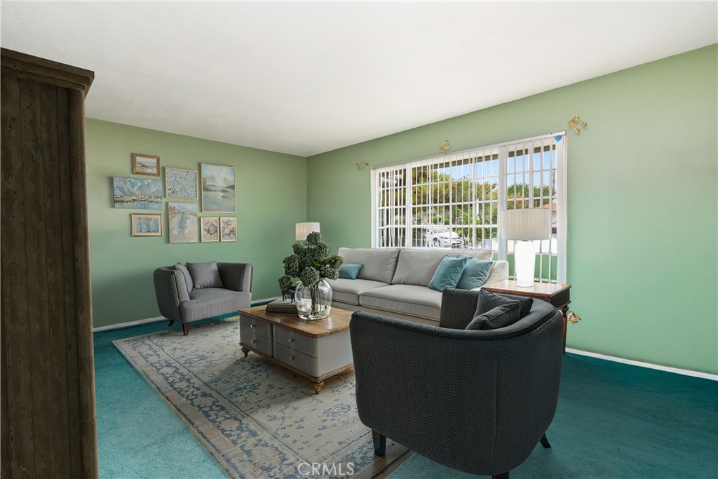 885 East Home Street Rialto, CA 92376 - Photo 5 of 26 a living room with furniture and a window