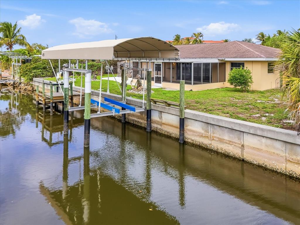 235 Pompano Terrace Punta Gorda, FL 33950 - Photo 26 of 30 a view of a swimming pool with a patio
