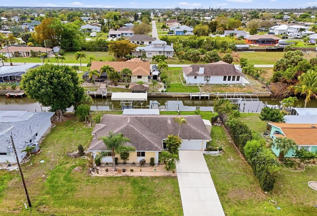 235 Pompano Terrace Punta Gorda, FL 33950 - Photo 29 of 30 an aerial view of residential houses with outdoor space and lake view