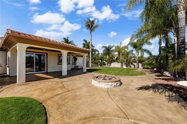 a front view of a house with garden and porch
