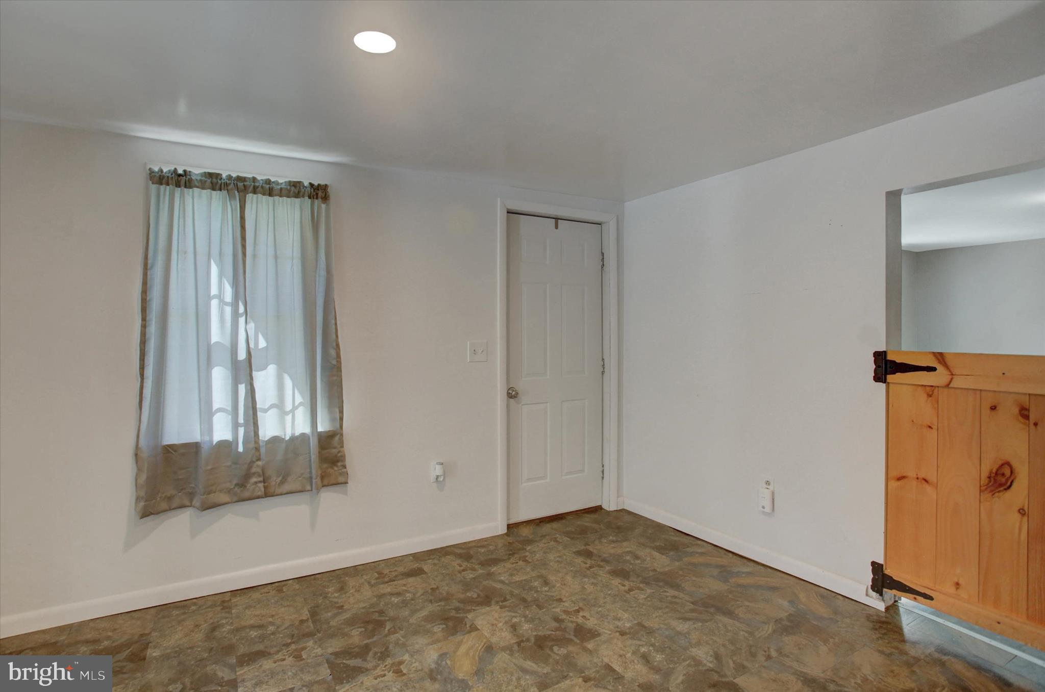 1611 Pine Road Carlisle, PA 17015 - Photo 12 of 45 an empty room with windows and closet