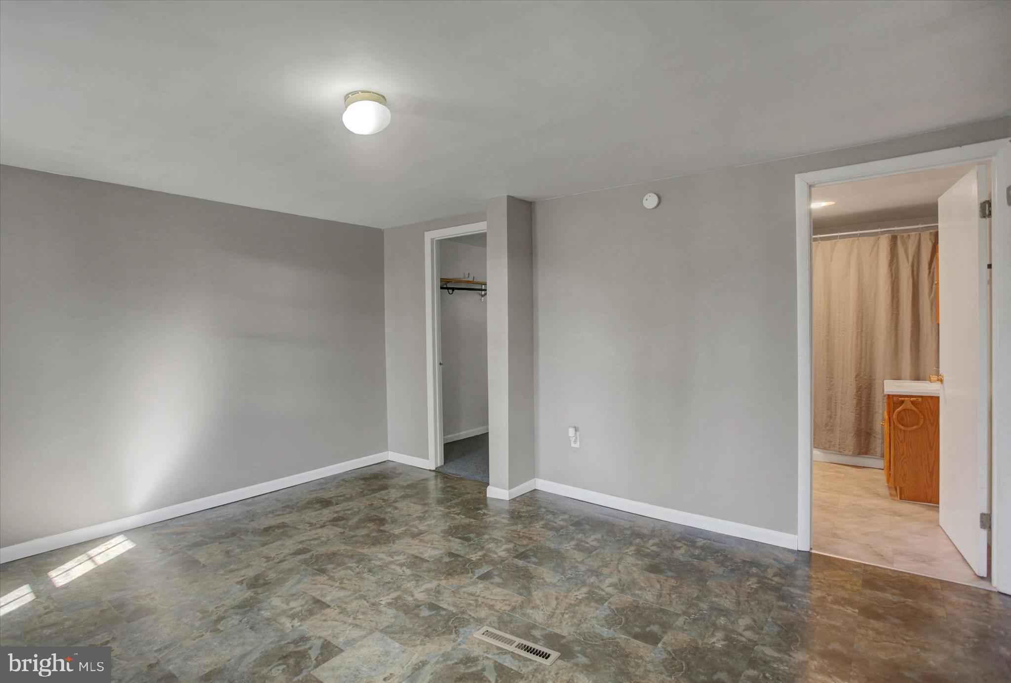 1611 Pine Road Carlisle, PA 17015 - Photo 14 of 45 an empty room with closet and bathroom