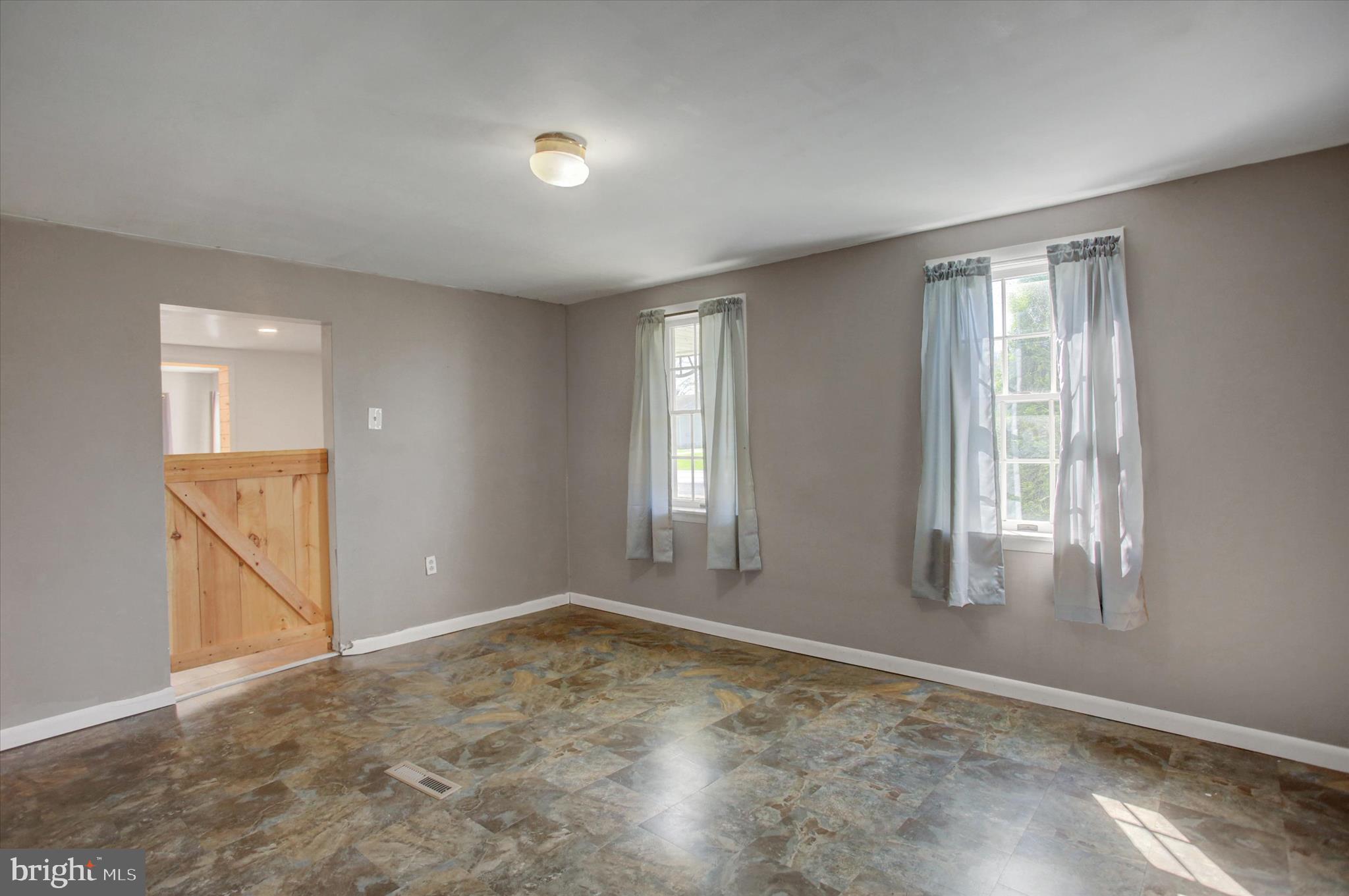 1611 Pine Road Carlisle, PA 17015 - Photo 16 of 45 an empty room with windows