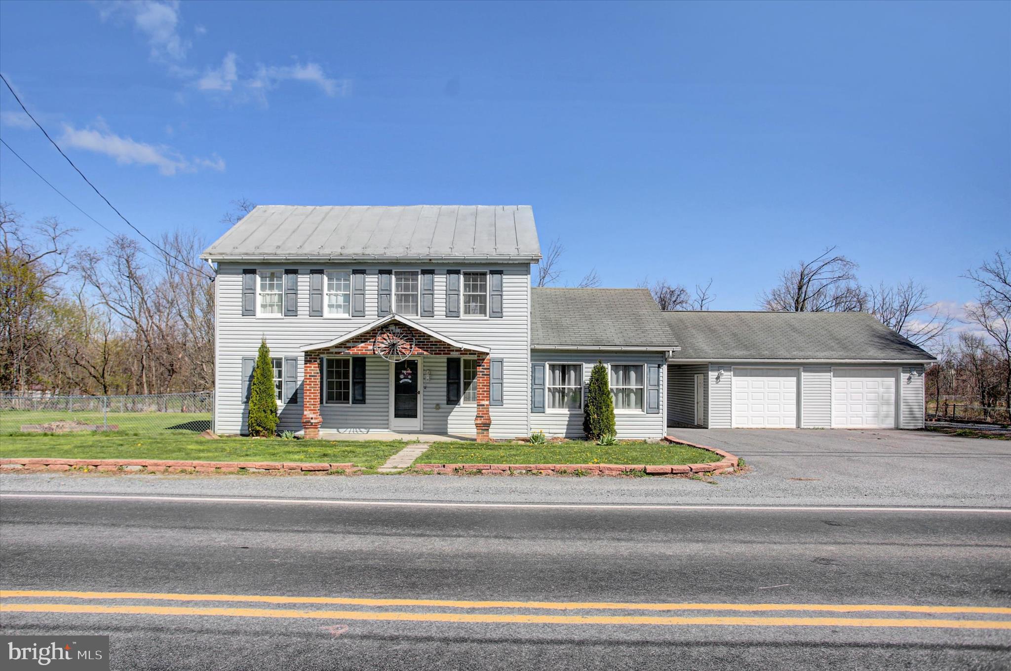 1611 Pine Road Carlisle, PA 17015 - Photo 2 of 45 a front view of a house with a ocean view