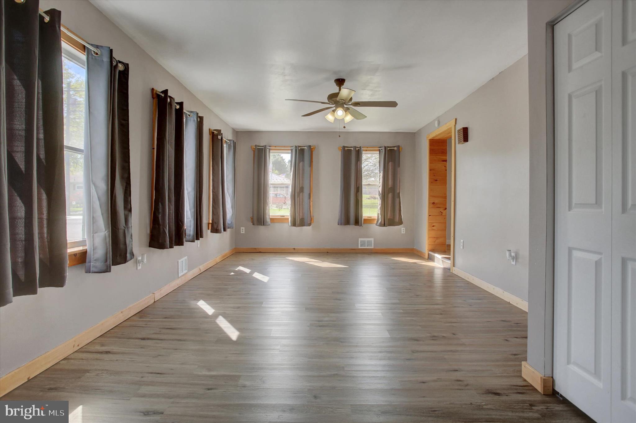 1611 Pine Road Carlisle, PA 17015 - Photo 23 of 45 wooden floor in an empty room with a window