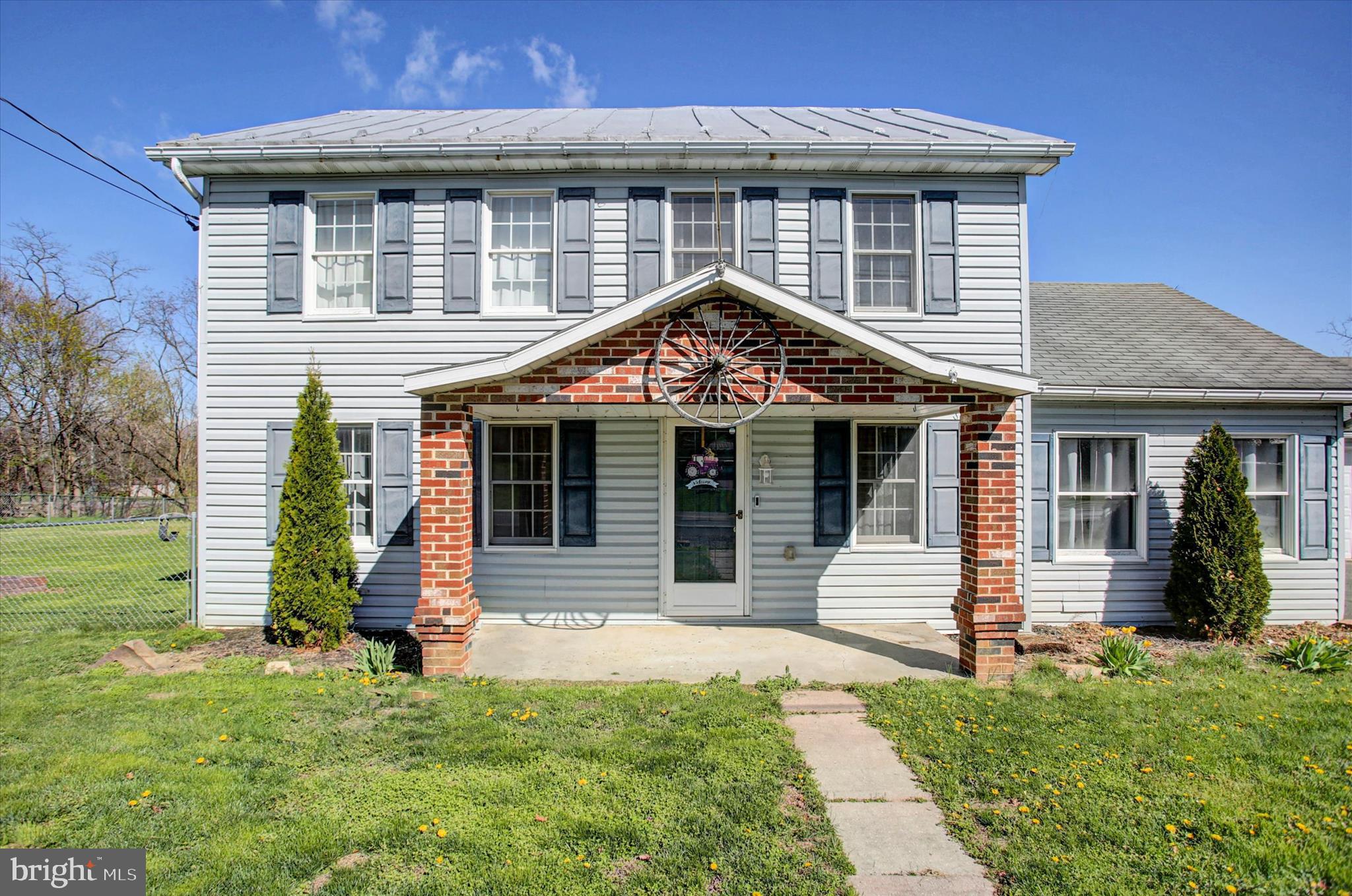 1611 Pine Road Carlisle, PA 17015 - Photo 6 of 45 front view of a house with a yard