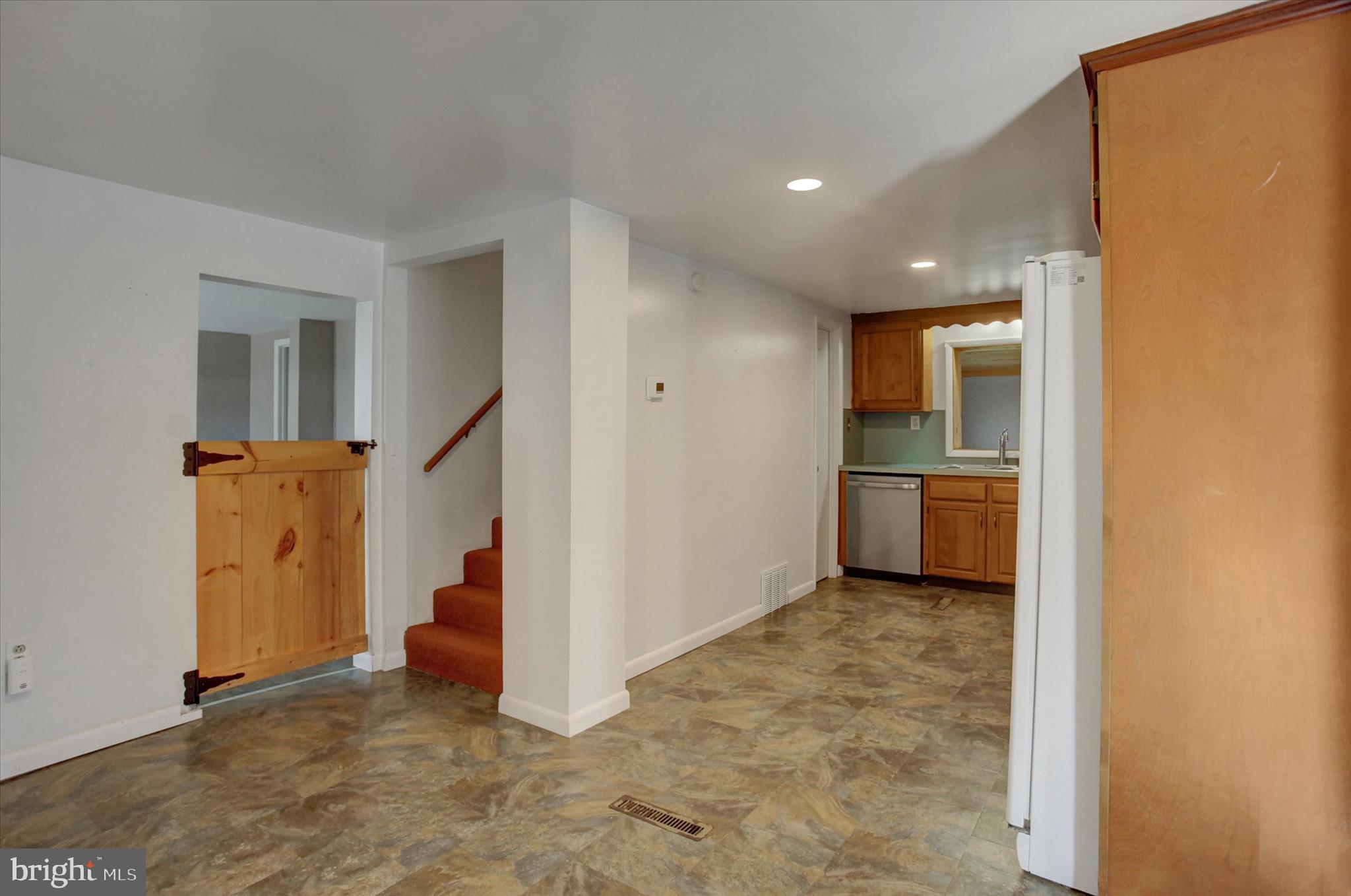 1611 Pine Road Carlisle, PA 17015 - Photo 8 of 45 a view of a kitchen with a sink and refrigerator