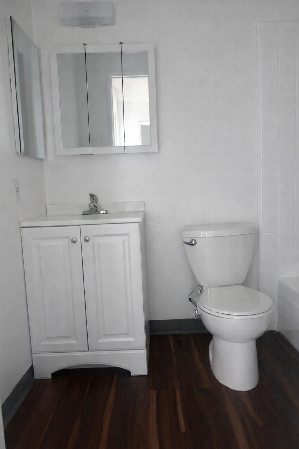 5935 Hickory Street, Unit 3 Carpinteria, CA 93013 - Photo 8 of 10 a bathroom with a toilet and a sink