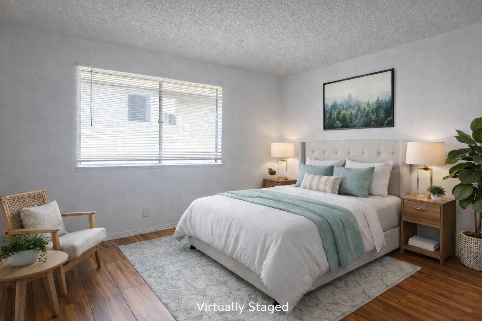 5935 Hickory Street, Unit 3 Carpinteria, CA 93013 - Photo 10 of 10 a bedroom with a bed and wooden floor