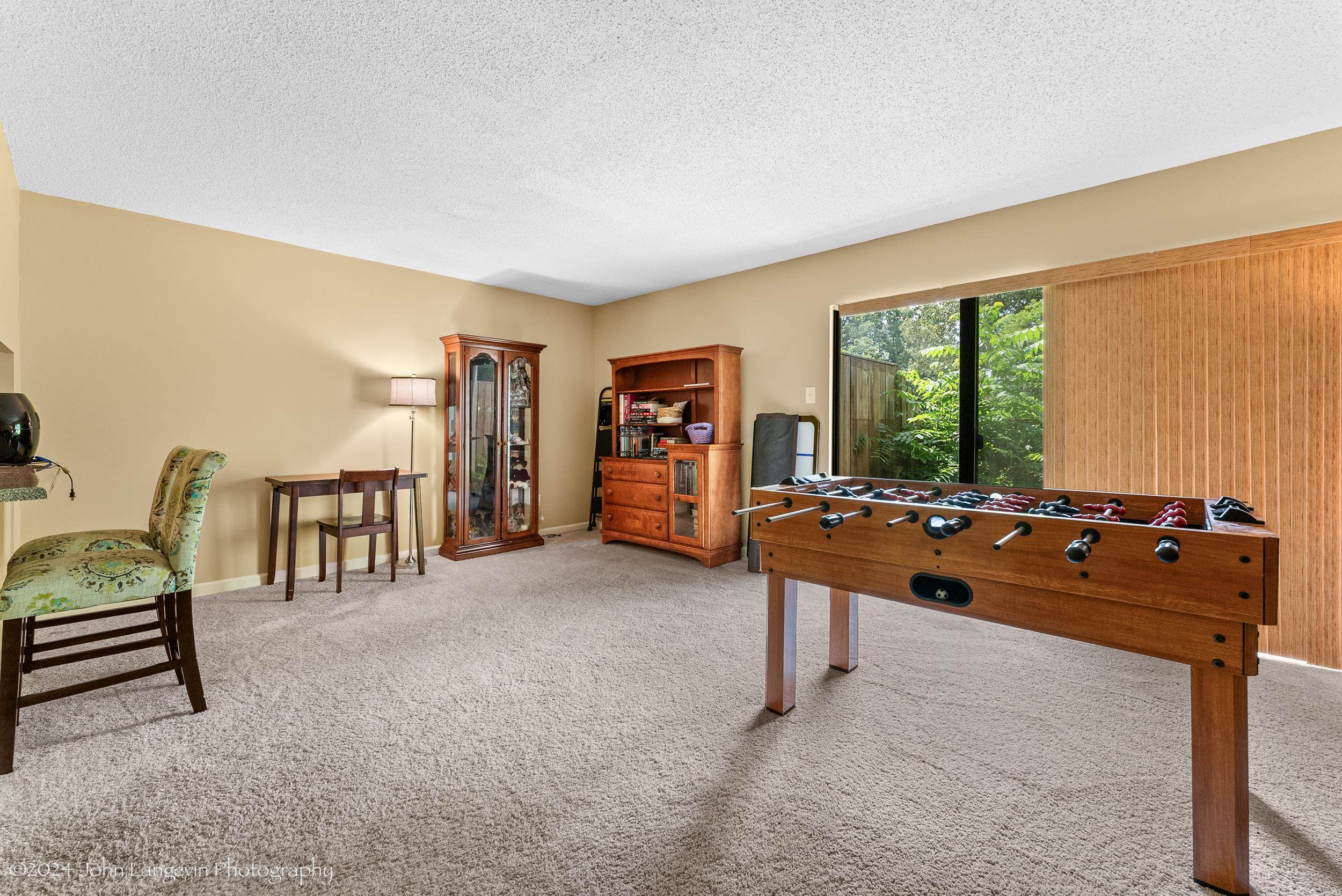 3118 Knob Hill Road Lakeland, TN 38002 - Photo 22 of 27 Game room featuring carpet flooring and a textured ceiling