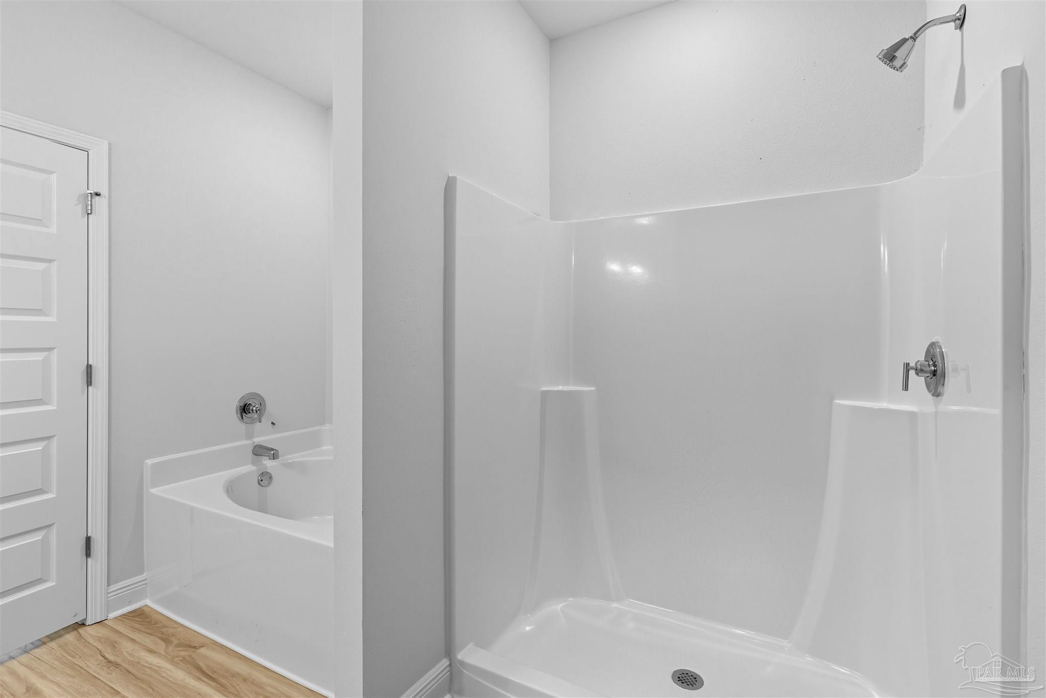 2808 Water Birch Road Cantonment, FL 32533 - Photo 11 of 41 a bathroom with a bathtub and shower