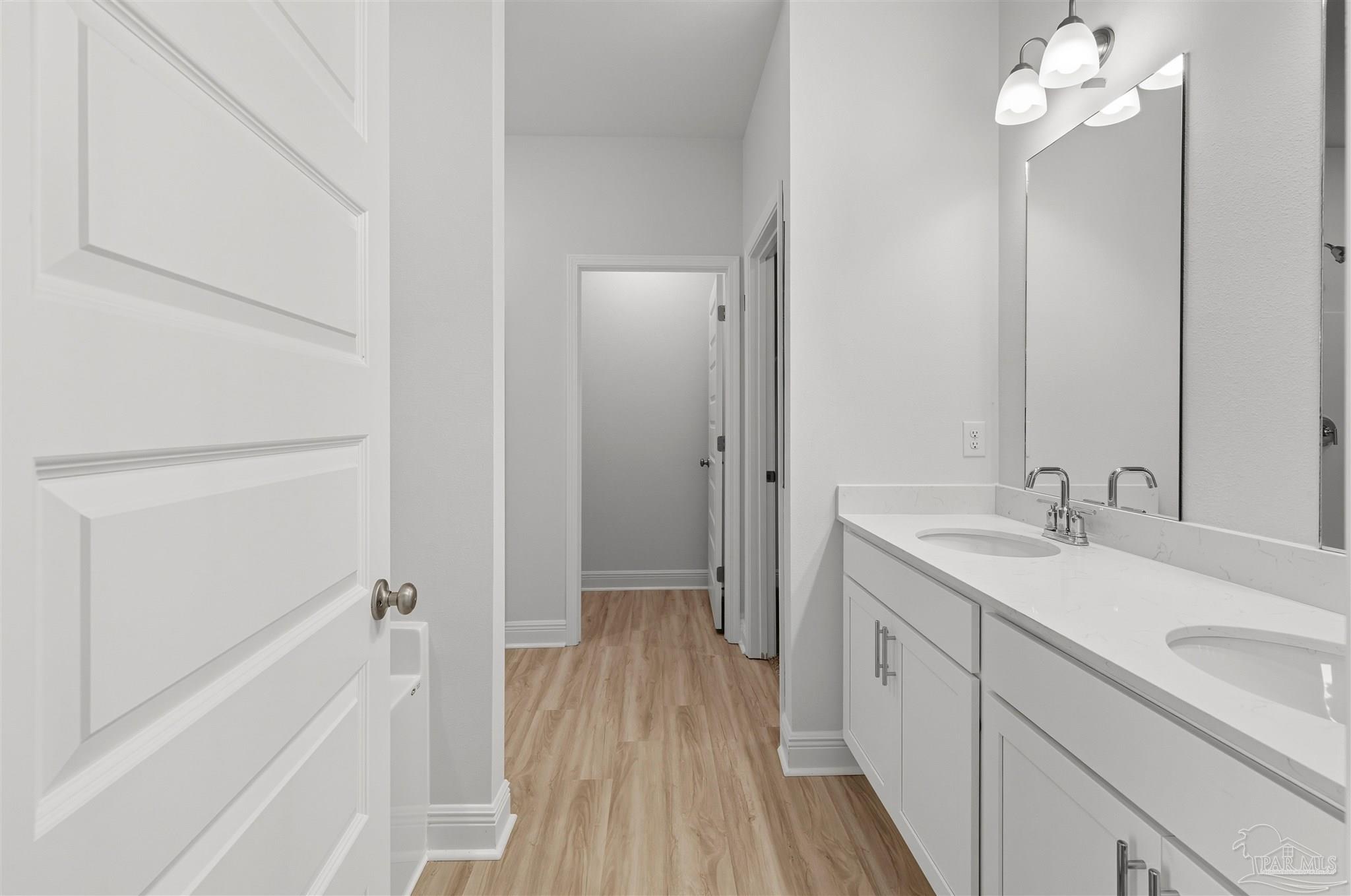 2808 Water Birch Road Cantonment, FL 32533 - Photo 30 of 41 a bathroom with a sink a toilet a mirror and shower