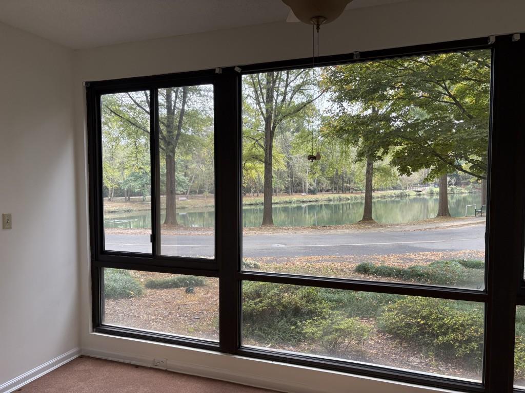 1800 Clairmont Lake, Unit 124 Decatur, GA 30033 - Photo 11 of 22 a view of a room with large windows and plants