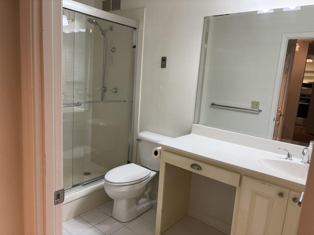 1800 Clairmont Lake, Unit 124 Decatur, GA 30033 - Photo 15 of 22 a bathroom with a sink toilet and shower