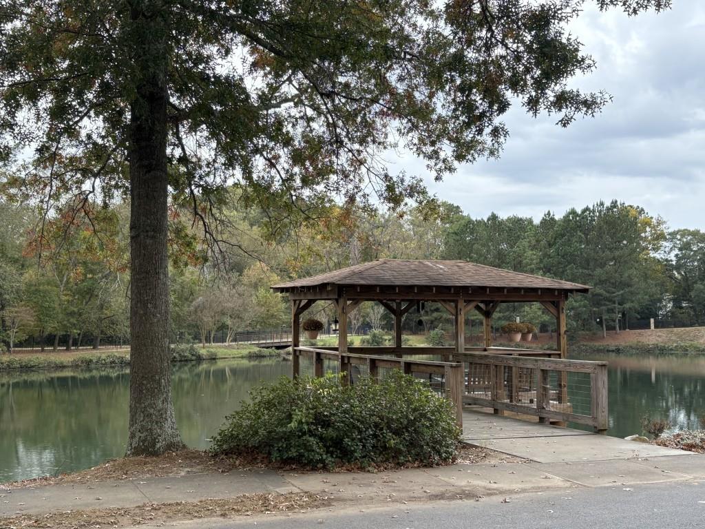 1800 Clairmont Lake, Unit 124 Decatur, GA 30033 - Photo 22 of 22 a view of a lake with a patio