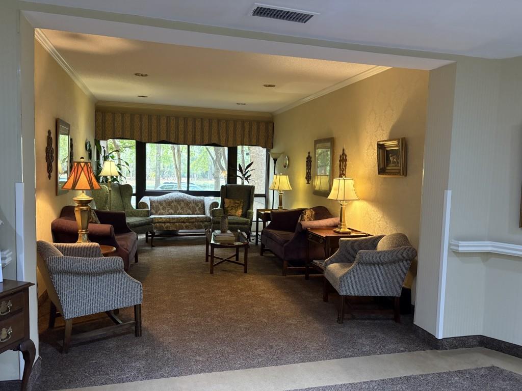 1800 Clairmont Lake, Unit 124 Decatur, GA 30033 - Photo 4 of 22 a living room with furniture and a large window