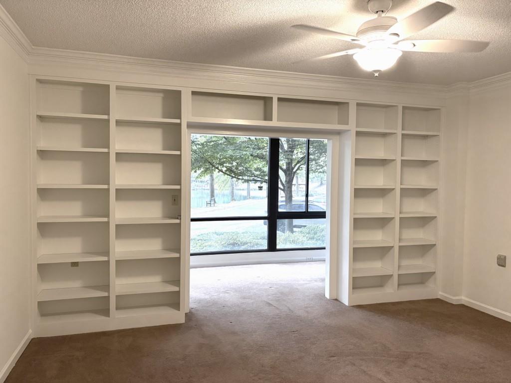 1800 Clairmont Lake, Unit 124 Decatur, GA 30033 - Photo 10 of 22 a view of an empty room with a window
