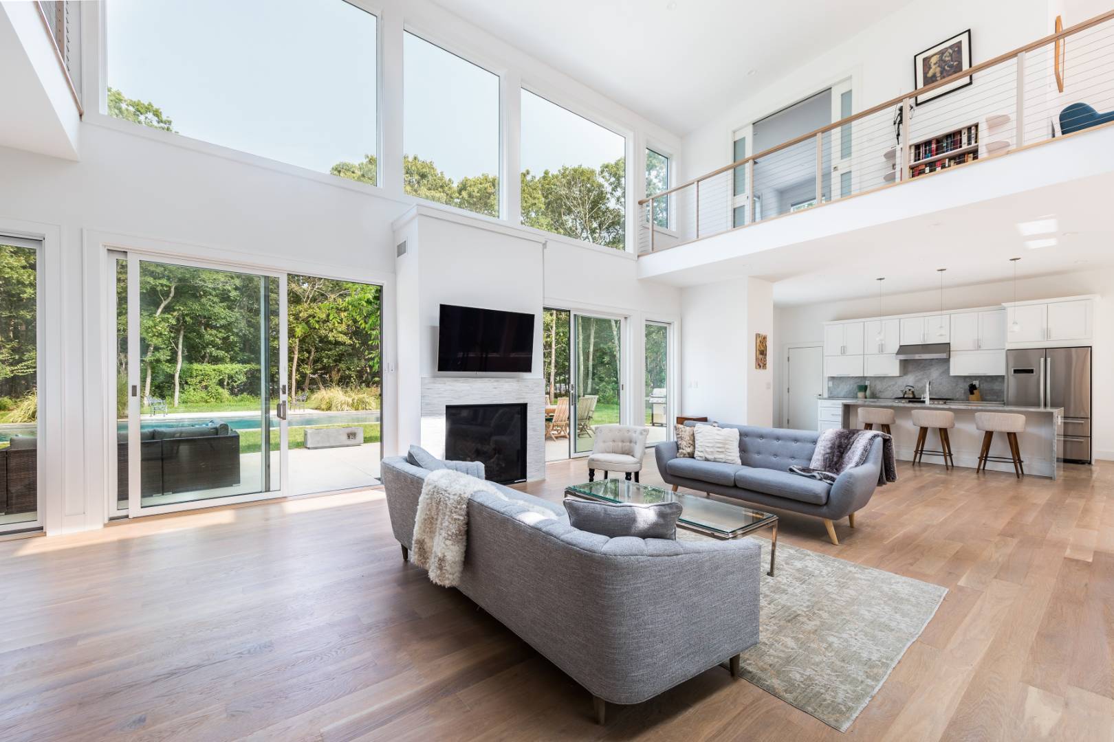 6 Landfall Circle East Hampton, NY 11937 - Photo 2 of 26 a living room with furniture fireplace and flat screen tv