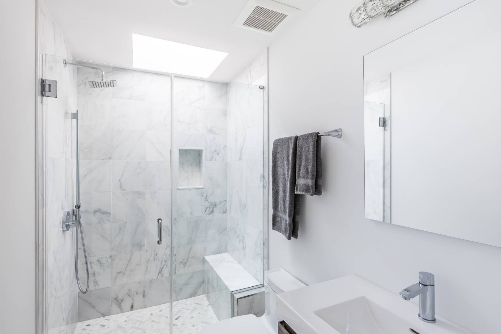 6 Landfall Circle East Hampton, NY 11937 - Photo 12 of 26 a bathroom with a shower and a toilet sink