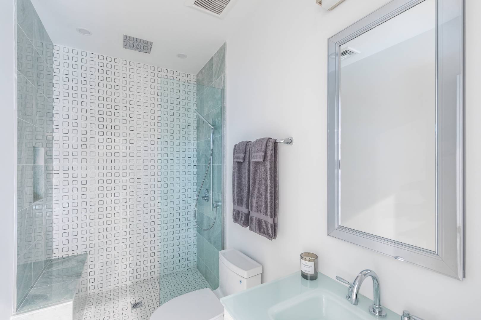 6 Landfall Circle East Hampton, NY 11937 - Photo 14 of 26 a bathroom with a sink toilet and shower