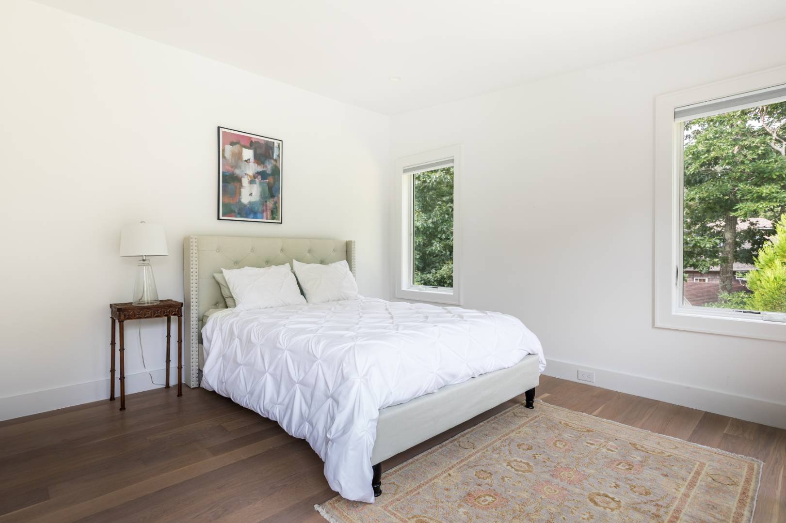 6 Landfall Circle East Hampton, NY 11937 - Photo 15 of 26 a bedroom with a bed and a window