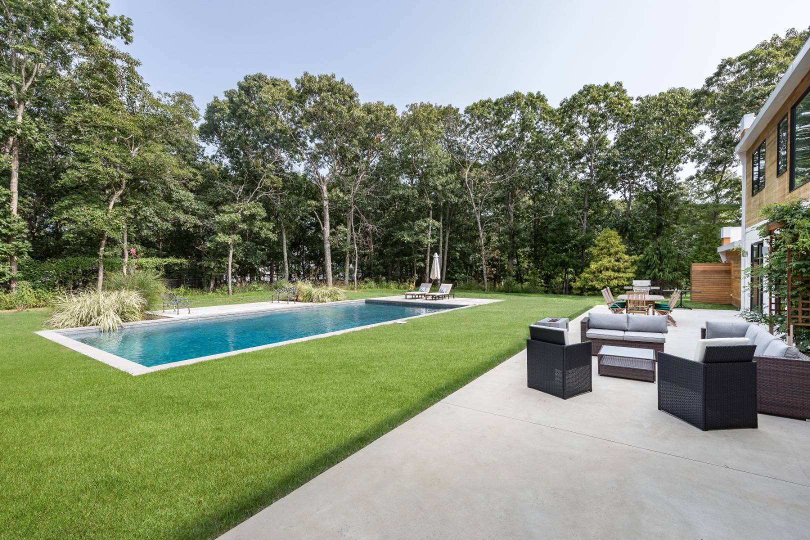 6 Landfall Circle East Hampton, NY 11937 - Photo 21 of 26 a view of a house with a swimming pool
